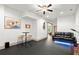 Inviting living room featuring a sleek leather sofa and barstool seating perfect for relaxing and entertaining at 49 Waterside Se Dr, Cartersville, GA 30121