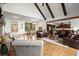 Bright living space with hardwood floors, stone fireplace, and access to the kitchen at 49 Waterside Se Dr, Cartersville, GA 30121