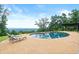Inviting outdoor pool with lounge chairs, and beautiful views in a serene setting at 49 Waterside Se Dr, Cartersville, GA 30121