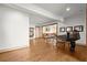 Open recreation area featuring a ping pong table, hardwood floors, and easy access to the exterior grounds at 49 Waterside Se Dr, Cartersville, GA 30121