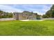 Expansive backyard featuring an in-ground pool and privacy fence, ideal for outdoor entertaining and relaxation at 1197 Kenilworth Trce Trce, Snellville, GA 30078