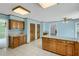 Spacious eat-in kitchen with granite countertops, wood cabinetry, and ample counter space for cooking and entertaining at 1197 Kenilworth Trce Trce, Snellville, GA 30078