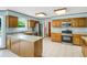 Spacious kitchen featuring granite countertops, stainless steel appliances, and ample cabinet space for a functional and stylish cooking area at 1197 Kenilworth Trce Trce, Snellville, GA 30078