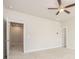 Spacious bedroom with ceiling fan and access to other rooms at 1247 Winterhaven Dr, Cumming, GA 30041