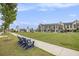 Community park featuring expansive green space, walking paths, and Adirondack chairs for seating at 1247 Winterhaven Dr, Cumming, GA 30041