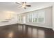 Bright, open living area with hardwood floors, large windows, and recessed lighting at 1247 Winterhaven Dr, Cumming, GA 30041