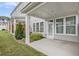 Charming patio with ample space, perfect for outdoor entertaining or relaxation, and featuring verdant landscaping at 1247 Winterhaven Dr, Cumming, GA 30041