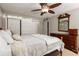 A comfortable bedroom featuring a wooden bed frame and a large wardrobe at 1445 Monroe Ne Dr # 14B, Atlanta, GA 30324