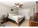 Cozy bedroom featuring a comfortable bed, ceiling fan, and closet for ample storage at 1445 Monroe Ne Dr # 14B, Atlanta, GA 30324