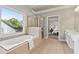 Bright bathroom featuring a soaking tub with a window view and separate glass shower at 2165 Parkview Nw Run, Atlanta, GA 30318