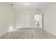 Spacious bedroom with a double closet and an open door showing an entry console at 2165 Parkview Nw Run, Atlanta, GA 30318