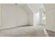 Bright bedroom with vaulted ceilings and a window that lets in natural light at 2165 Parkview Nw Run, Atlanta, GA 30318