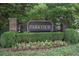 Parkview community entrance sign amid lush landscaping and flower beds at 2165 Parkview Nw Run, Atlanta, GA 30318