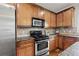 Gourmet kitchen featuring stainless appliances, granite countertops, and custom cabinets at 2165 Parkview Nw Run, Atlanta, GA 30318