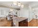 Open eat-in kitchen with a center island, wooden cabinets, and stainless steel appliances at 2165 Parkview Nw Run, Atlanta, GA 30318