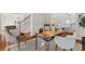 Spacious office featuring hardwood floors, chair rail, and a view of staircase and living room at 2165 Parkview Nw Run, Atlanta, GA 30318