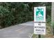 Paved community walking path, perfect for leisurely strolls and outdoor activity among the neighborhood's natural beauty at 2165 Parkview Nw Run, Atlanta, GA 30318