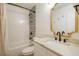 Bright bathroom features a shower and tub combination with black and white patterned tiles and modern fixtures at 2855 Briarlake Ne Rd, Atlanta, GA 30345