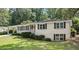 Inviting exterior view showcasing the home's charming curb appeal and carport at 2855 Briarlake Ne Rd, Atlanta, GA 30345