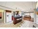 Finished basement with a kitchenette, bar seating, a lounge area with a sofa, and tiled/wood flooring at 1285 Willow Park Way, Cumming, GA 30041