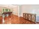 Dining room with hardwood floors, elegant chandelier, and a mirrored accent cabinet at 1285 Willow Park Way, Cumming, GA 30041