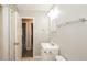 Bright bathroom featuring a modern vanity, toilet and brushed nickel fixtures at 1112 Evelyn Drive Dr, Forest Park, GA 30297