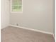 Bedroom with neutral carpet, natural light, and freshly painted walls at 1112 Evelyn Drive Dr, Forest Park, GA 30297