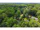 Residential area with a lush tree canopy, featuring homes with well-maintained lawns and landscaping at 269 Terrydale Se Dr, Marietta, GA 30067