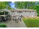 Backyard with patio including an outdoor dining area with grill and wicker seating at 269 Terrydale Se Dr, Marietta, GA 30067