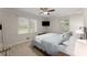 Inviting bedroom featuring a ceiling fan, carpet, and two windows at 269 Terrydale Se Dr, Marietta, GA 30067
