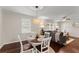 Cozy dining area with hardwood floors, natural light, and seamless flow to the living room at 269 Terrydale Se Dr, Marietta, GA 30067