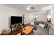 Comfortable living room featuring hardwood floors and a stylish entertainment center at 269 Terrydale Se Dr, Marietta, GA 30067