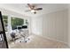 Bright office space featuring a ceiling fan, carpet, and two monitors on the desk at 269 Terrydale Se Dr, Marietta, GA 30067