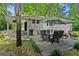Outdoor patio area with a dining table, umbrella, and comfortable seating, perfect for entertaining at 269 Terrydale Se Dr, Marietta, GA 30067