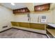 Basement storage space with built-in shelving and cabinets, providing ample space and efficient organization at 2917 Rockingham Nw Dr, Atlanta, GA 30327