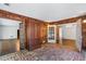 Unique living room featuring brick floor and accents, offering a rustic and inviting space at 2917 Rockingham Nw Dr, Atlanta, GA 30327