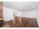 Spacious living room with fireplace and hardwood floors, perfect for entertaining and Gathering gatherings at 2917 Rockingham Nw Dr, Atlanta, GA 30327
