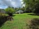 Expansive backyard with lush green grass and mature trees, creating a private and serene setting at 3400 Elm Creek Nw Dr, Marietta, GA 30064