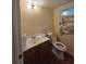 Half bathroom with floral curtain at 3400 Elm Creek Nw Dr, Marietta, GA 30064