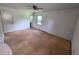 Bright bedroom needing new flooring and featuring a window view to the exterior at 3400 Elm Creek Nw Dr, Marietta, GA 30064