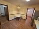 Cozy dining area with stylish lighting, complemented by views into other rooms and the kitchen at 3400 Elm Creek Nw Dr, Marietta, GA 30064