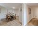 Bright basement features a table with seating and vinyl floors that leads to other rooms at 4023 Anvil Block Rd, Ellenwood, GA 30294