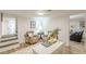 Finished basement features hardwood floors, neutral paint colors, a desk, and seating area at 4023 Anvil Block Rd, Ellenwood, GA 30294