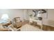 Finished basement featuring hardwood floors, neutral paint colors, and a cozy seating area at 4023 Anvil Block Rd, Ellenwood, GA 30294