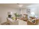 Finished basement features hardwood floors, neutral paint colors, a desk, and seating area at 4023 Anvil Block Rd, Ellenwood, GA 30294