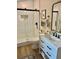 Modern bathroom featuring sleek vanity, subway tile shower, and matte black fixtures at 4023 Anvil Block Rd, Ellenwood, GA 30294