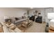 Cozy living room featuring comfortable seating, stylish decor, and warm ambiance at 4023 Anvil Block Rd, Ellenwood, GA 30294