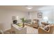 Bright home office with a checkered rug, comfortable chairs, and a stylish desk at 4023 Anvil Block Rd, Ellenwood, GA 30294