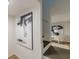 Modern staircase with contemporary artwork and stylish lighting at 4023 Anvil Block Rd, Ellenwood, GA 30294