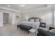 The main bedroom features carpet, a tray ceiling, and large closets at 10775 Brunson Dr, Johns Creek, GA 30097
